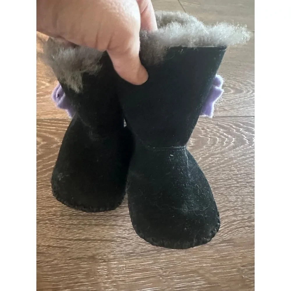Black and purple Ugg boots gray fur lined 4/5‎ Cassie bow boot
